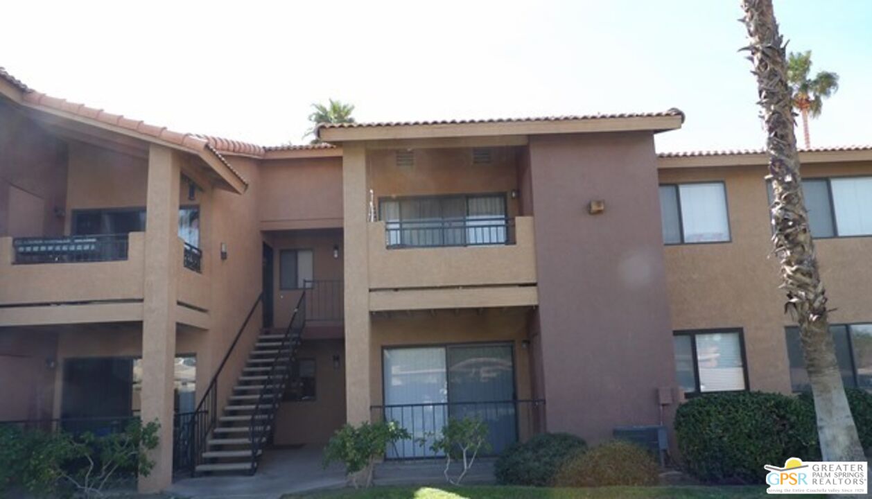 a front view of a house with a garage