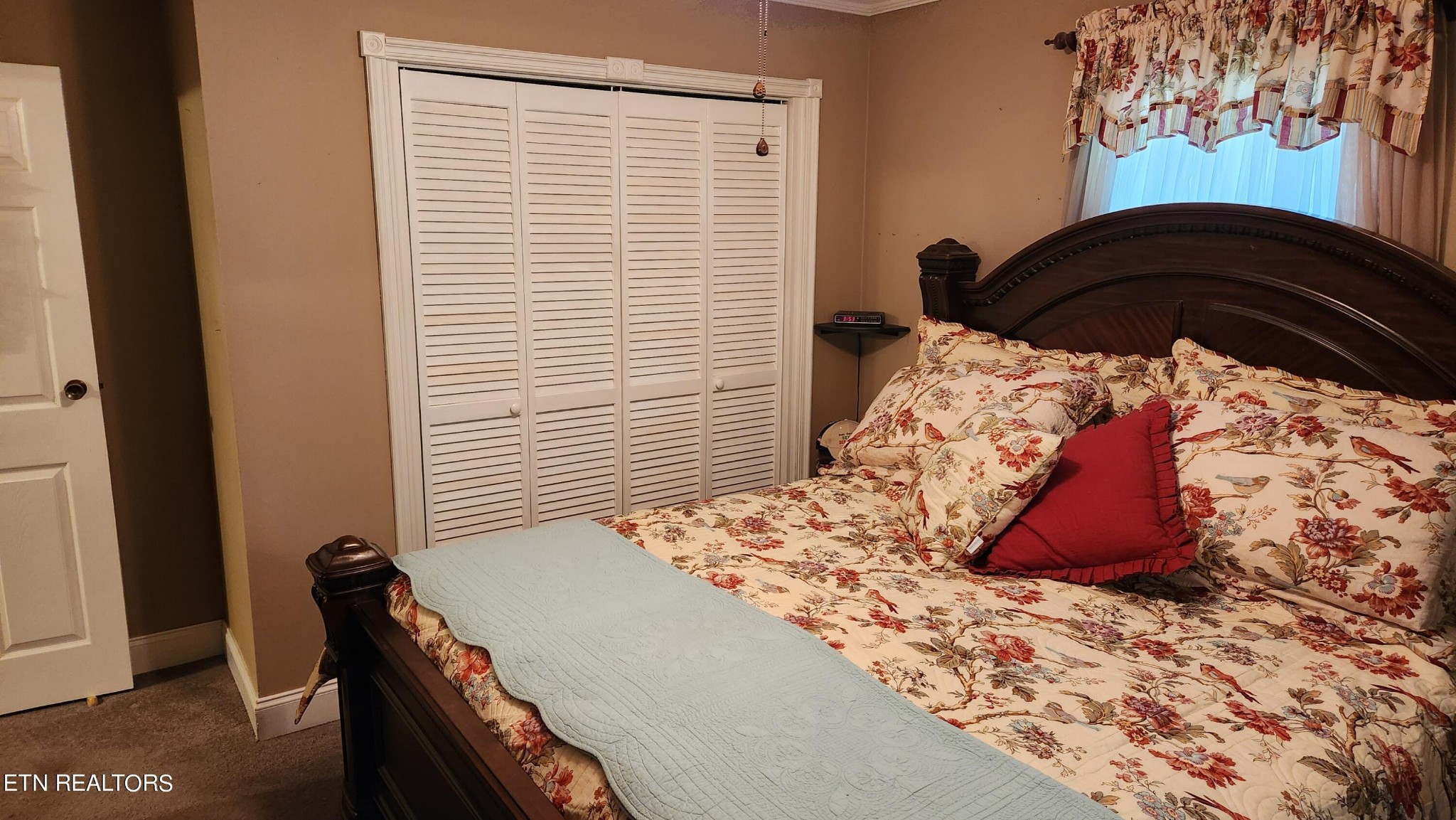 14915 Steekee Road Loudon, TN 37774 - Photo 32 of 37 a bedroom with a bed and a window