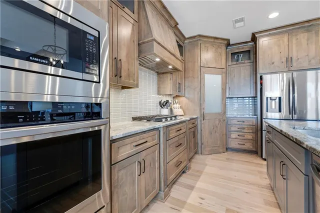 $749,900 | 1433 Woodland Road, Greenwood, MO 64034