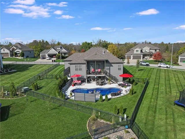 $749,900 | 1433 Woodland Road, Greenwood, MO 64034