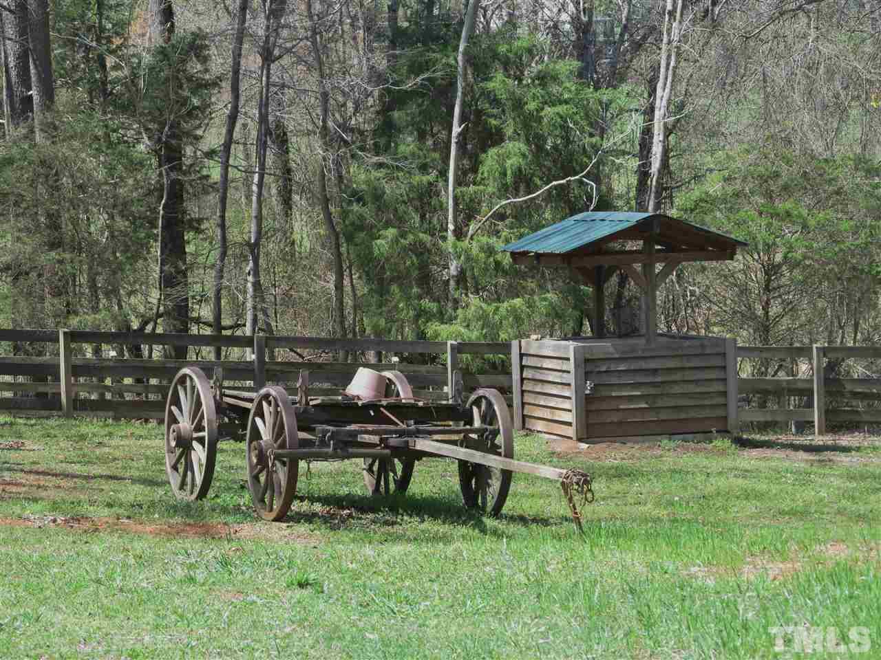 507 Mason Road Durham, NC 27712 - Photo 16 of 20 a view of a chair and table in the garden