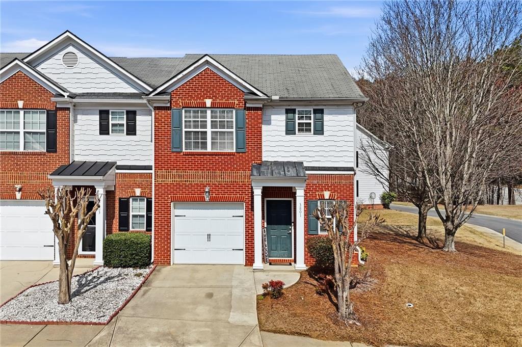 3801 Thayer Trace Duluth, GA 30096 - Photo 1 of 1 a front view of a house with parking area