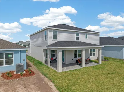 a view of a house with a patio