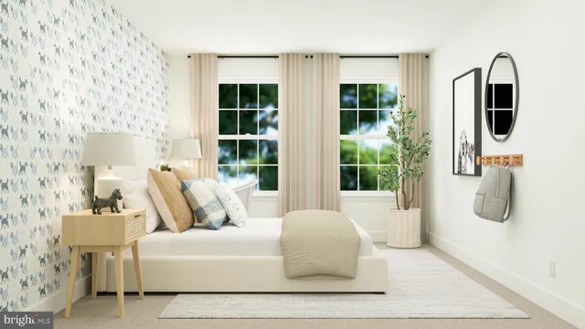 a bedroom with a bed and a couch