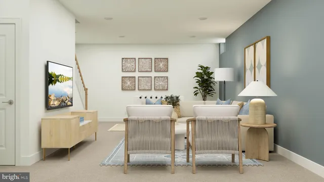 a living room with furniture and flowers