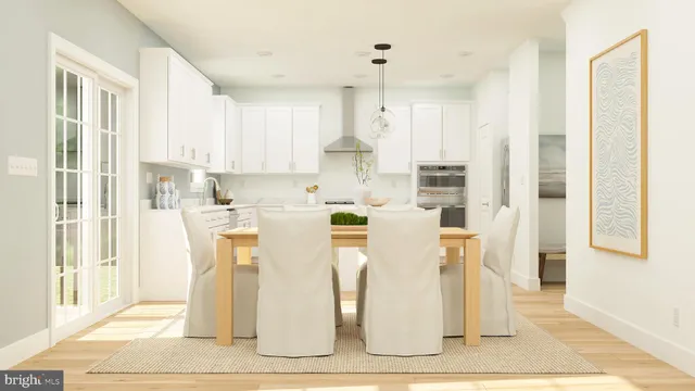 a dining room with wooden floor and a fireplace