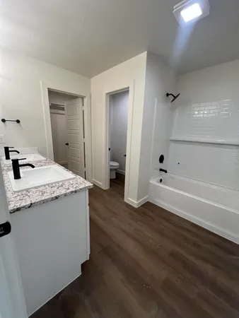 a view of cabinet with wooden floor