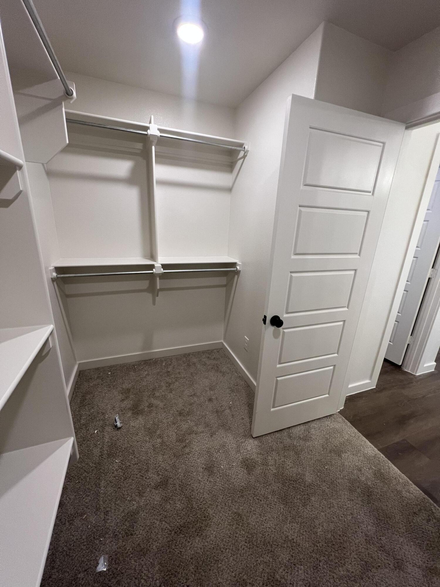 3105 140th Street Lubbock, TX 79423 - Photo 23 of 23 a view of an empty walk in closet
