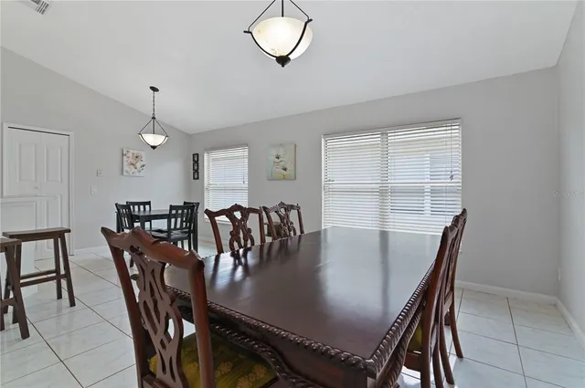 a view of a dining room with furniture