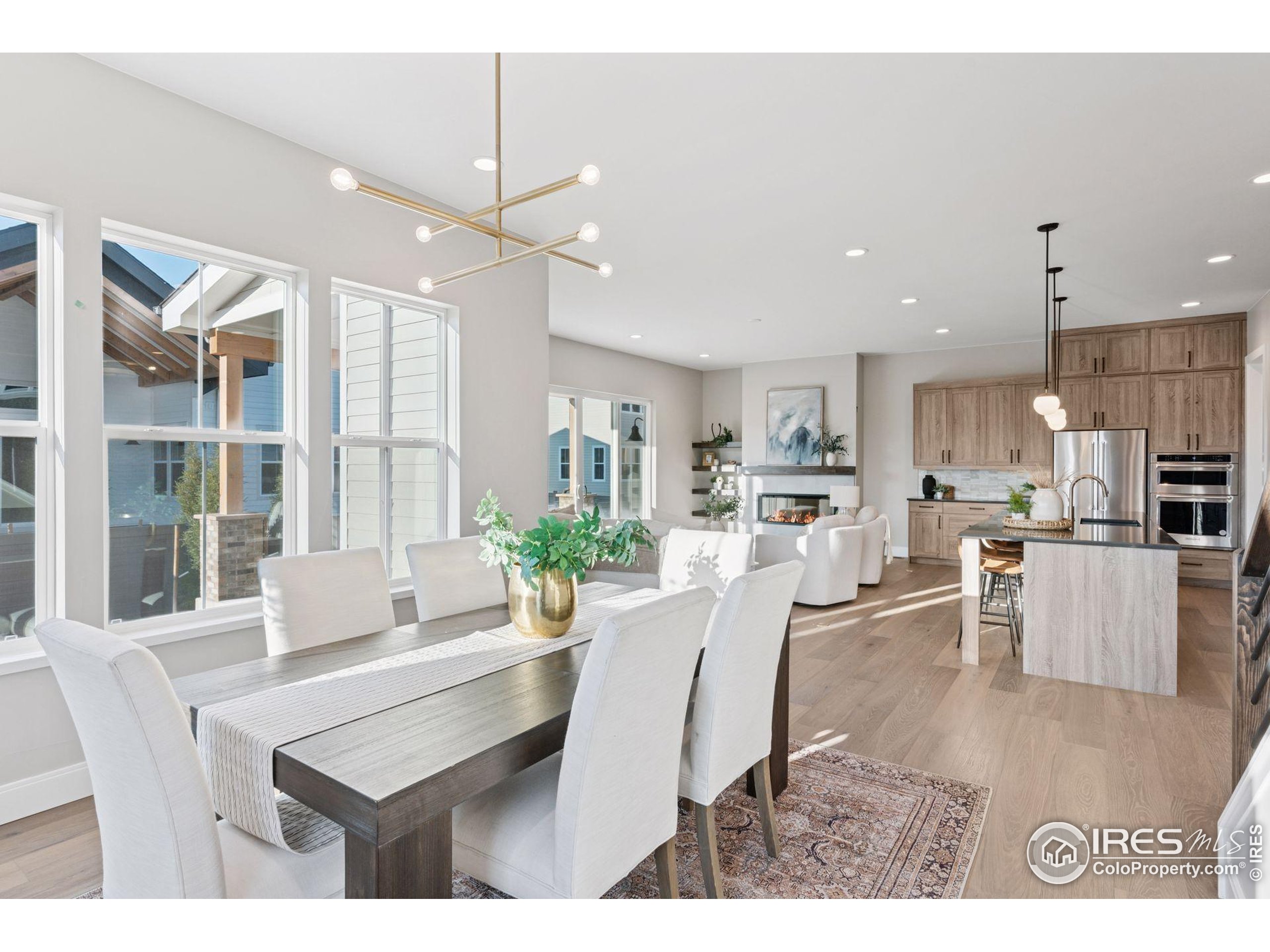 927 William Way Berthoud, CO 80513 - Photo 9 of 28 a dining room with furniture and window