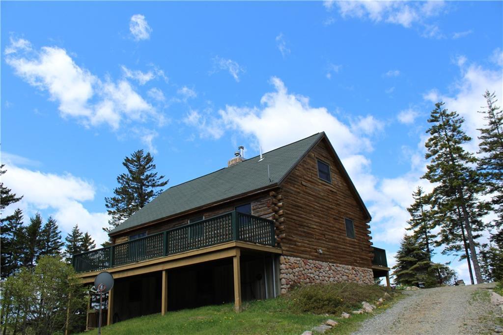 149 Chambers Point Road Roque Bluffs, ME 04654 - Photo 16 of 35 Back side of home with 3 sided wrap...