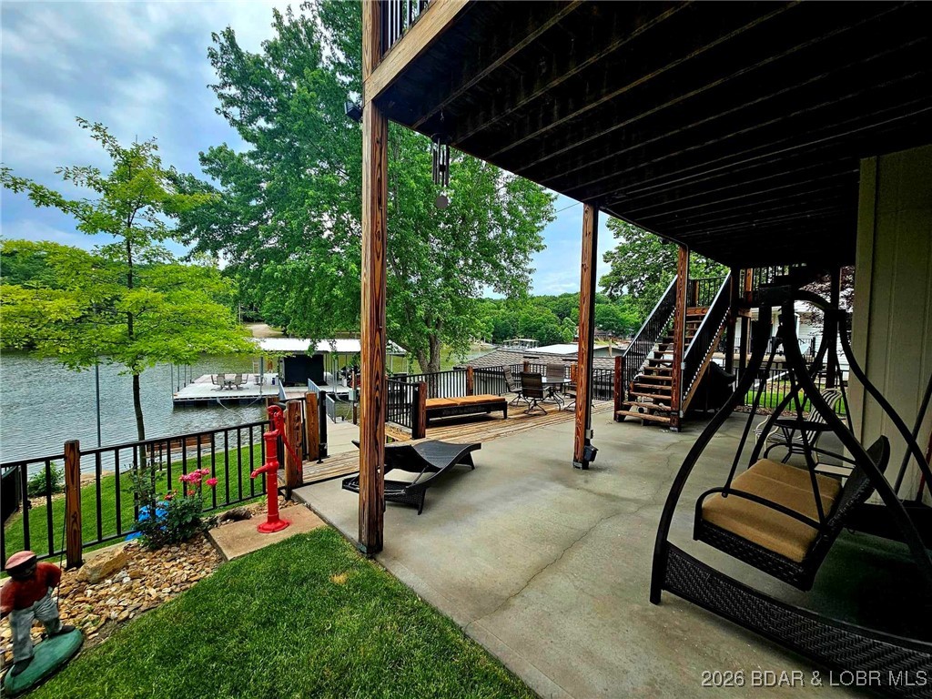 1185 Oval Road Climax Springs, MO 65324 - Photo 39 of 47 Lower level lakeside patio.