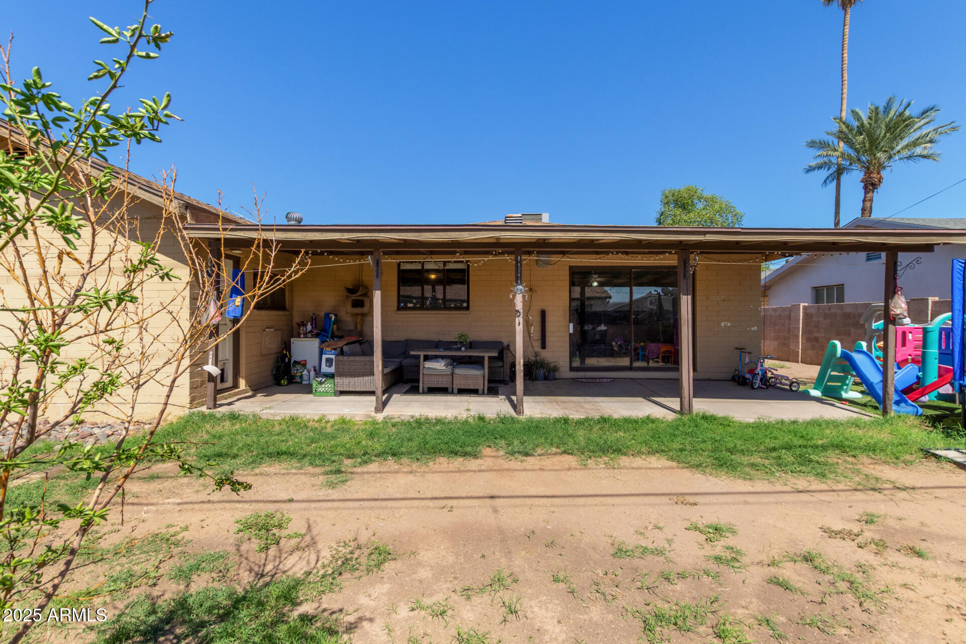 5439 West Osborn Road Phoenix, AZ 85031 - Photo 18 of 22 a view of a car park in front of a house