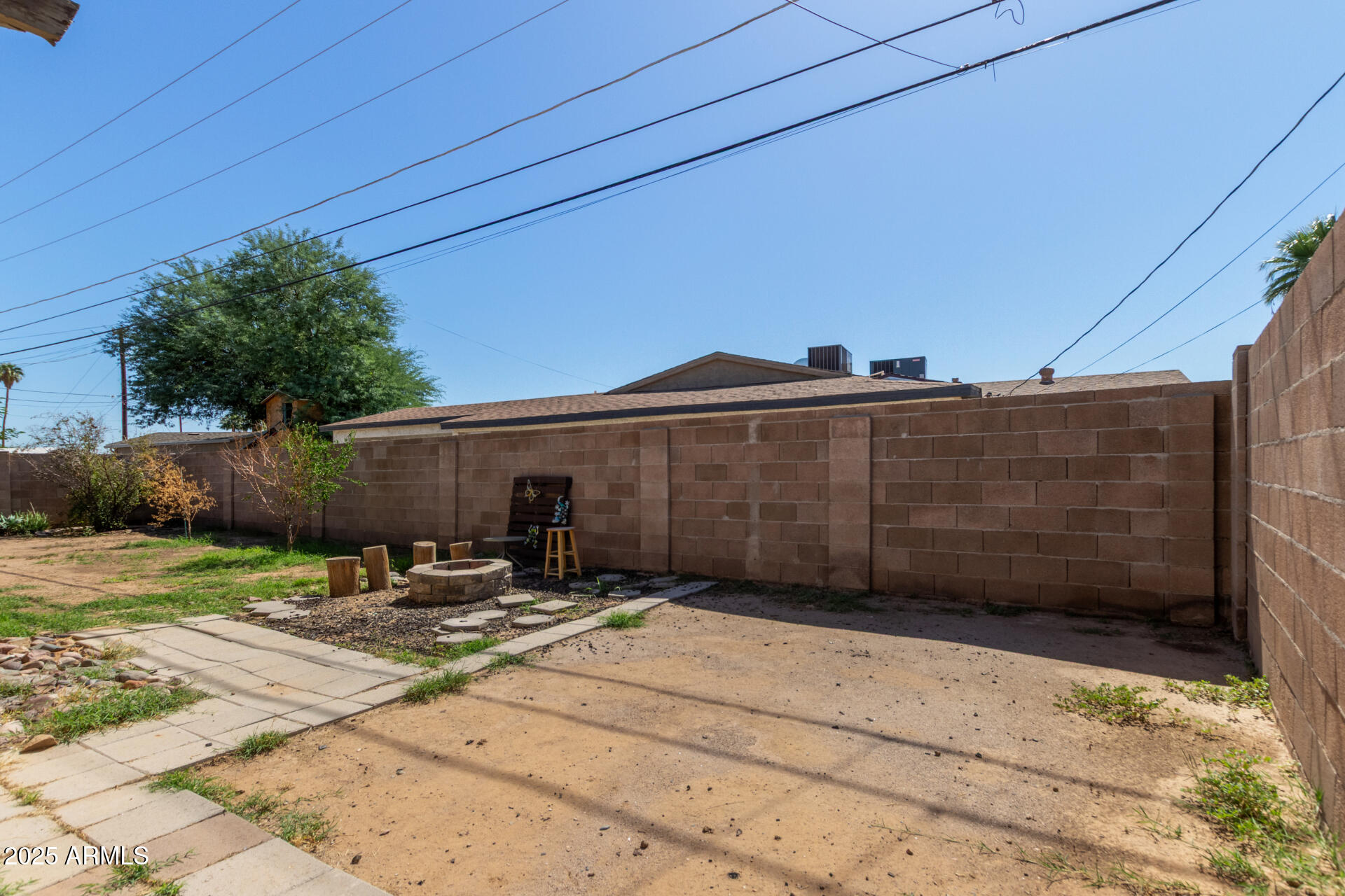 5439 West Osborn Road Phoenix, AZ 85031 - Photo 20 of 22 a backyard of a house