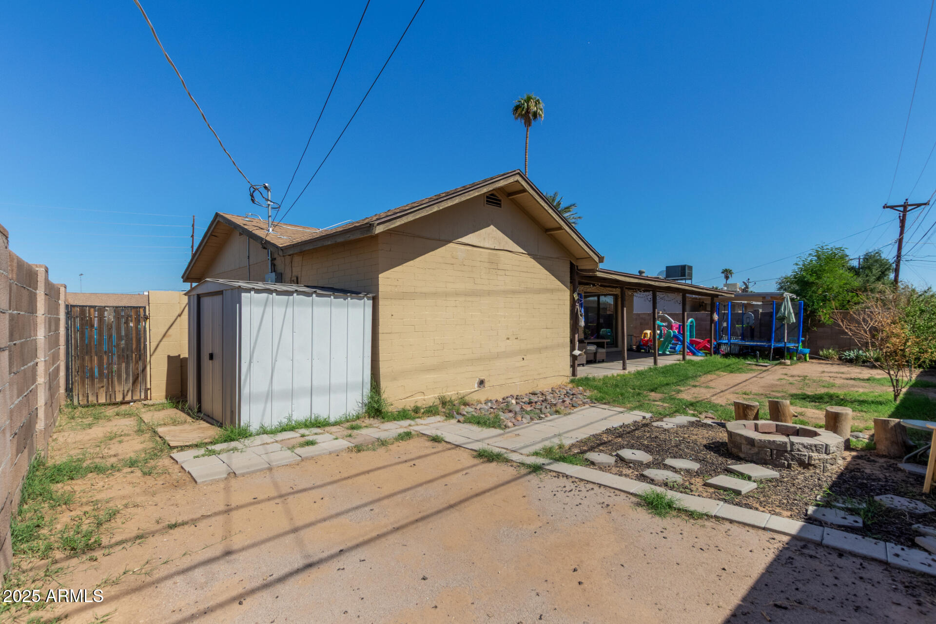5439 West Osborn Road Phoenix, AZ 85031 - Photo 21 of 22 a front view of a house with garden