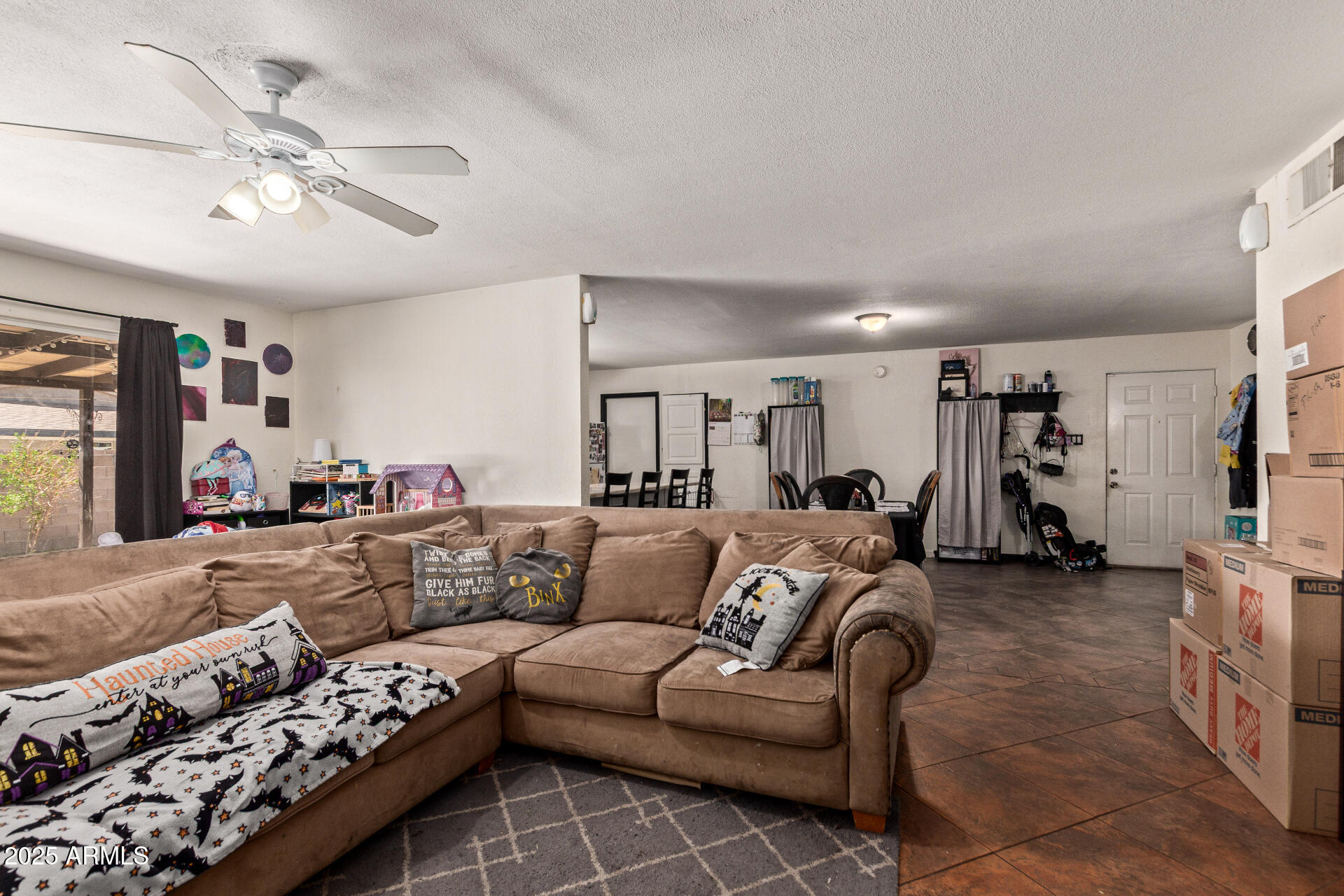 5439 West Osborn Road Phoenix, AZ 85031 - Photo 5 of 22 a living room with furniture and wooden floor