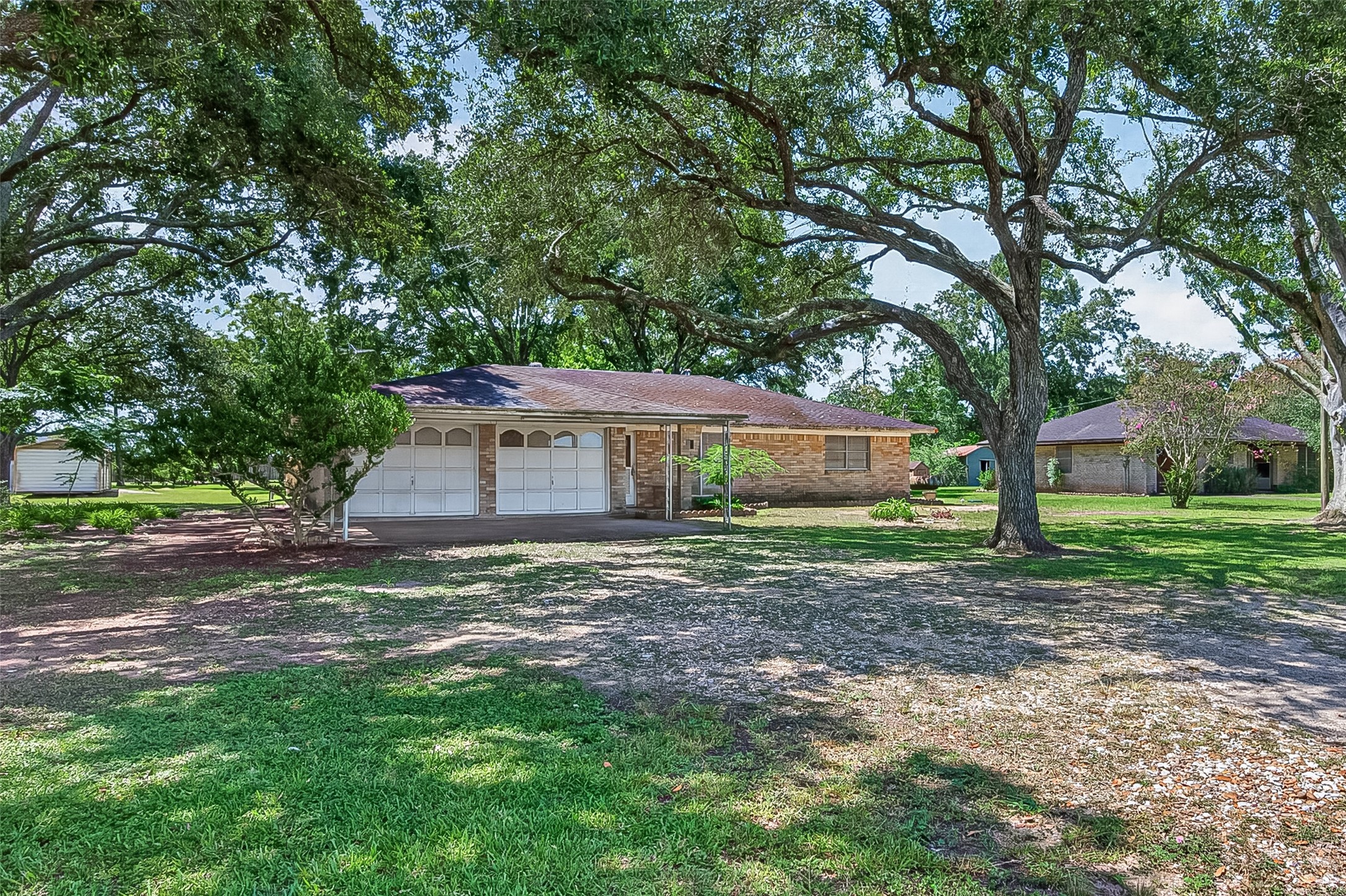 11105 Needville Fairchilds Road Needville, TX 77461 - Photo 1 of 24 a view of a house with a yard