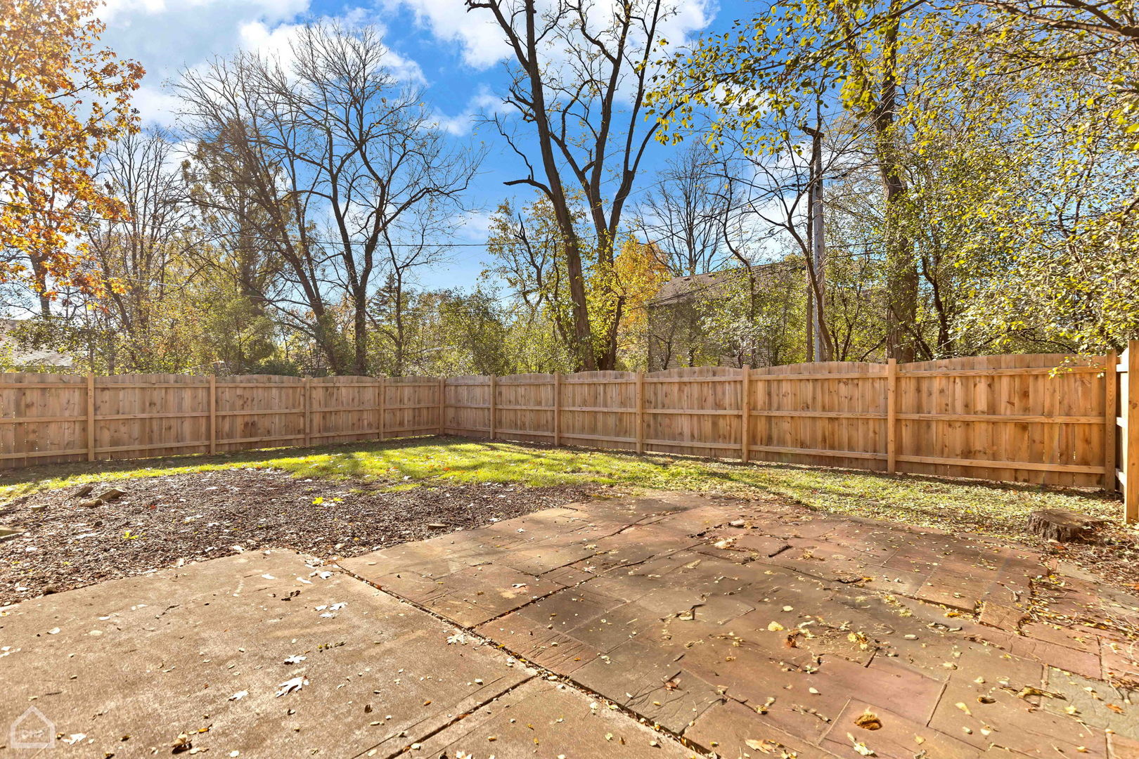 17830 Tipton Avenue Homewood, IL 60430 - Photo 11 of 40 a view of a yard with trees in the background