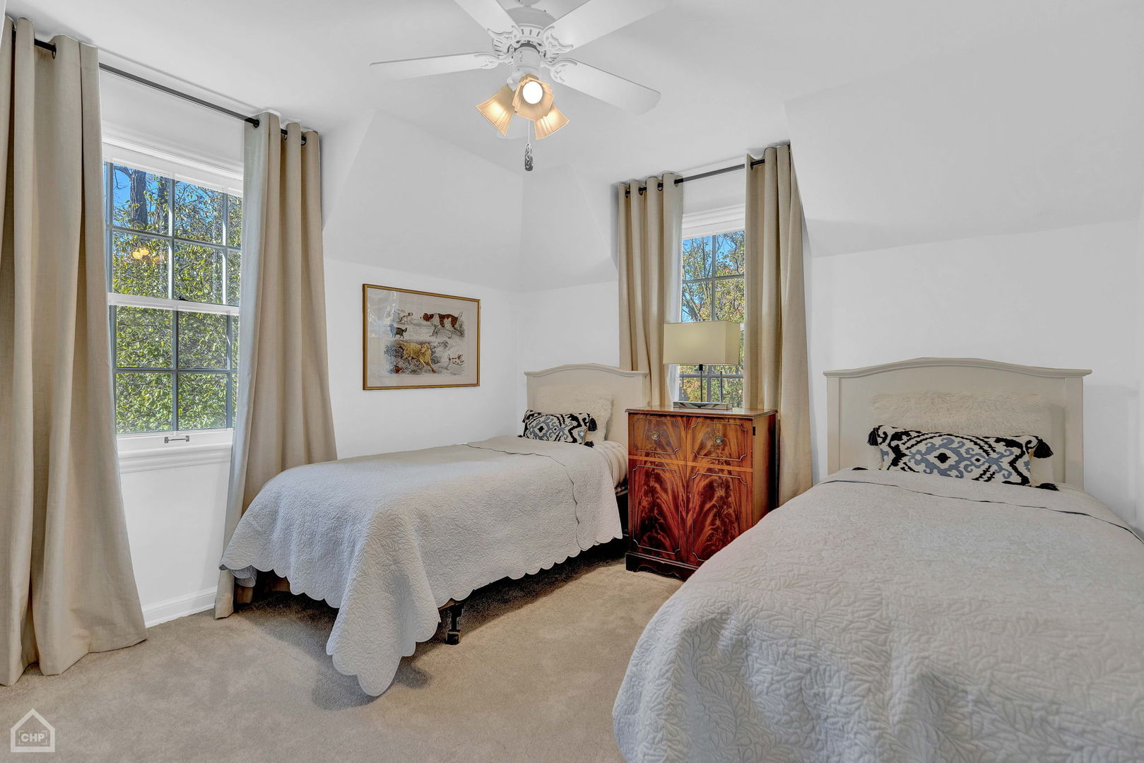 17830 Tipton Avenue Homewood, IL 60430 - Photo 36 of 40 a bedroom with two beds and a large mirror next to a window