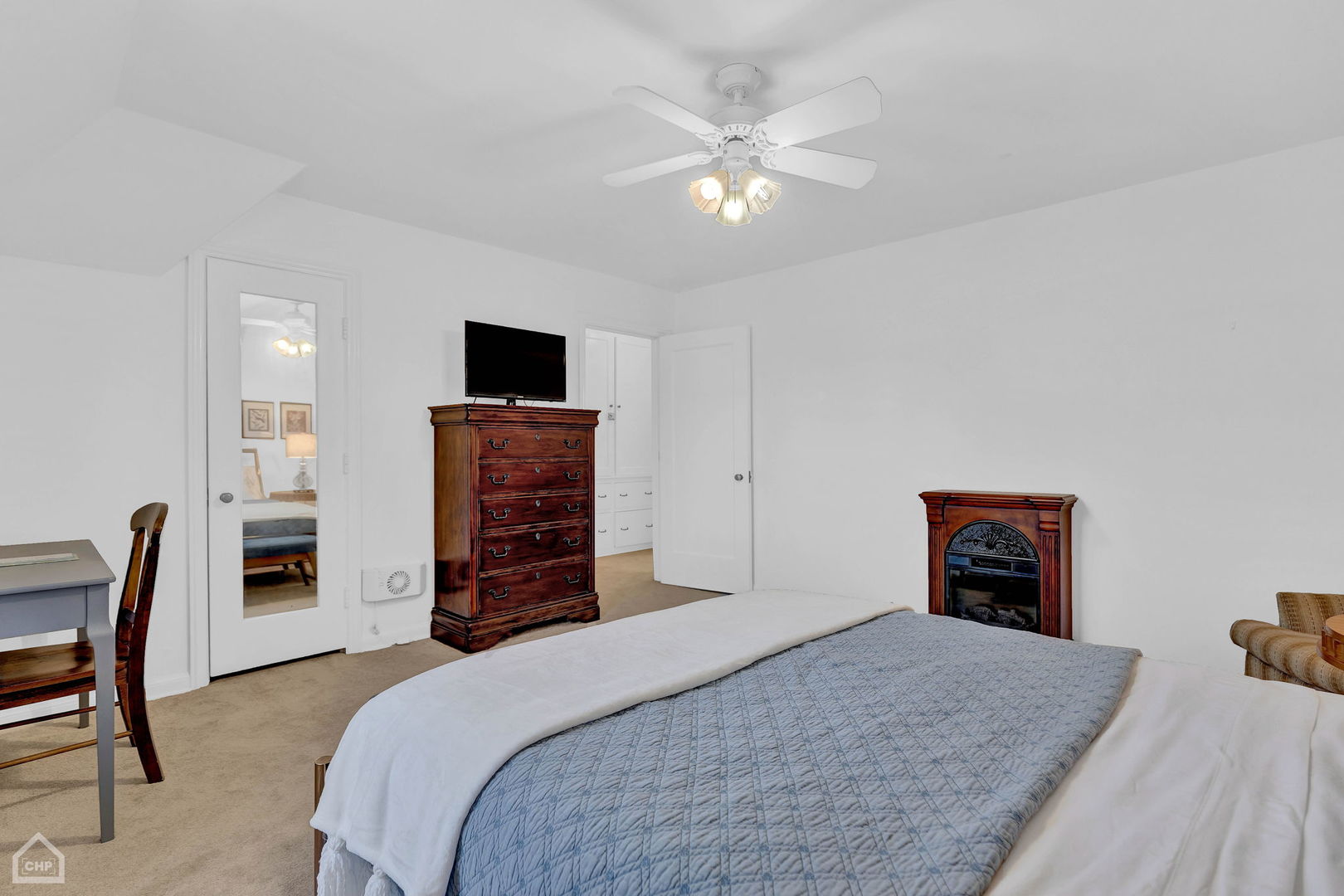 17830 Tipton Avenue Homewood, IL 60430 - Photo 39 of 40 a bedroom with a bed and a television