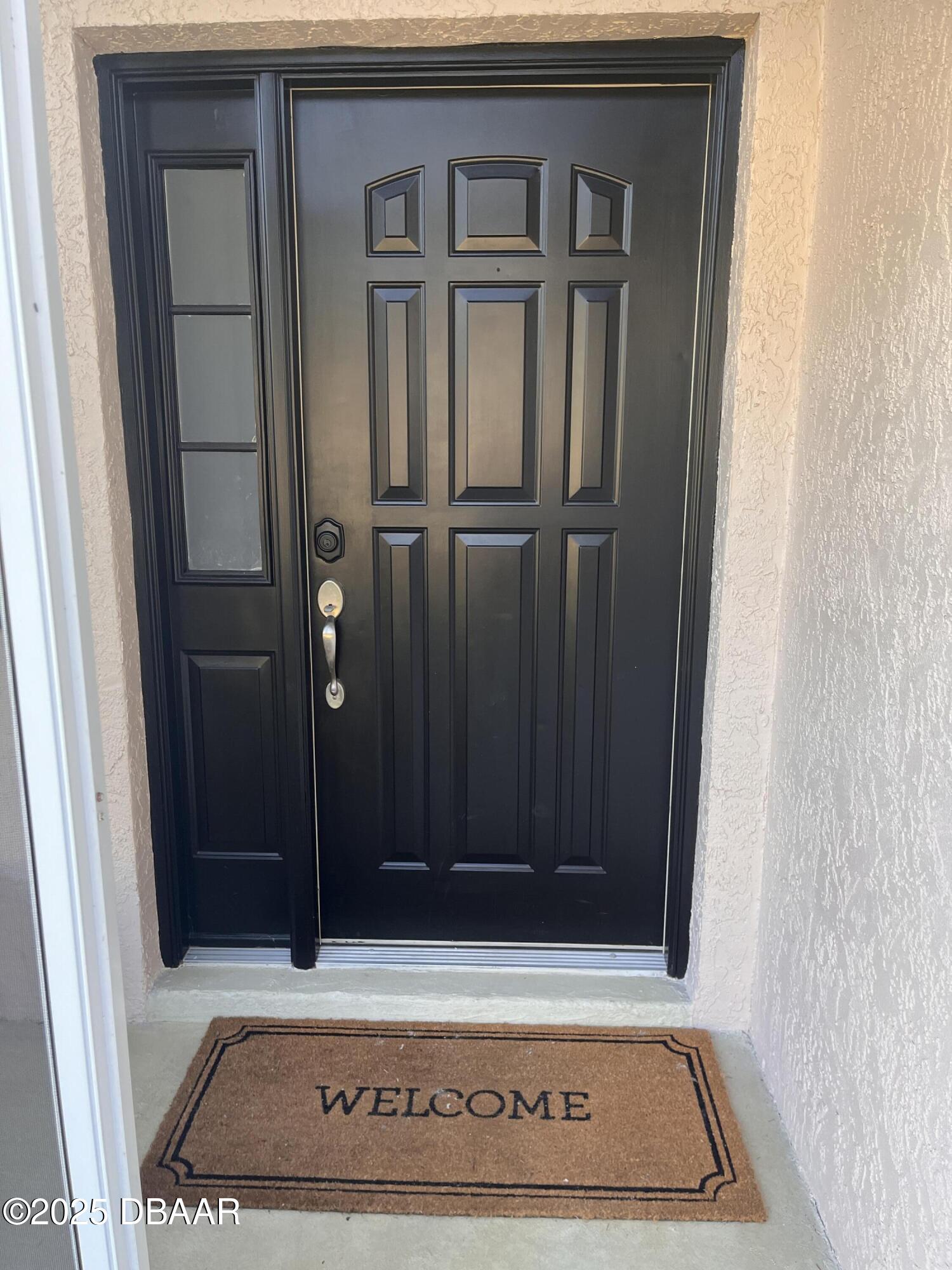 612 John Thomas Avenue DeLand, FL 32724 - Photo 3 of 11 a view of a door