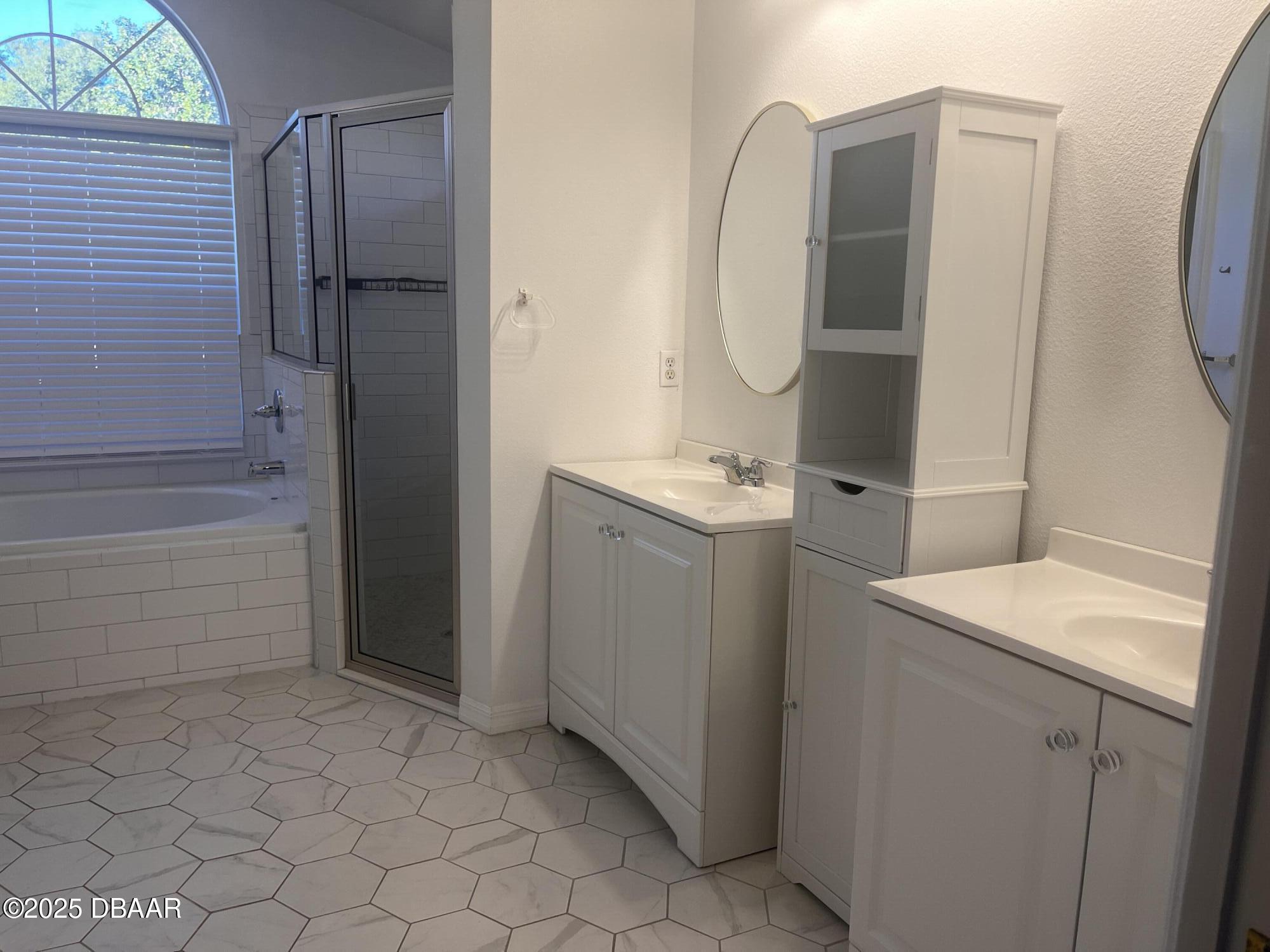 612 John Thomas Avenue DeLand, FL 32724 - Photo 8 of 11 a bathroom with a sink toilet and shower