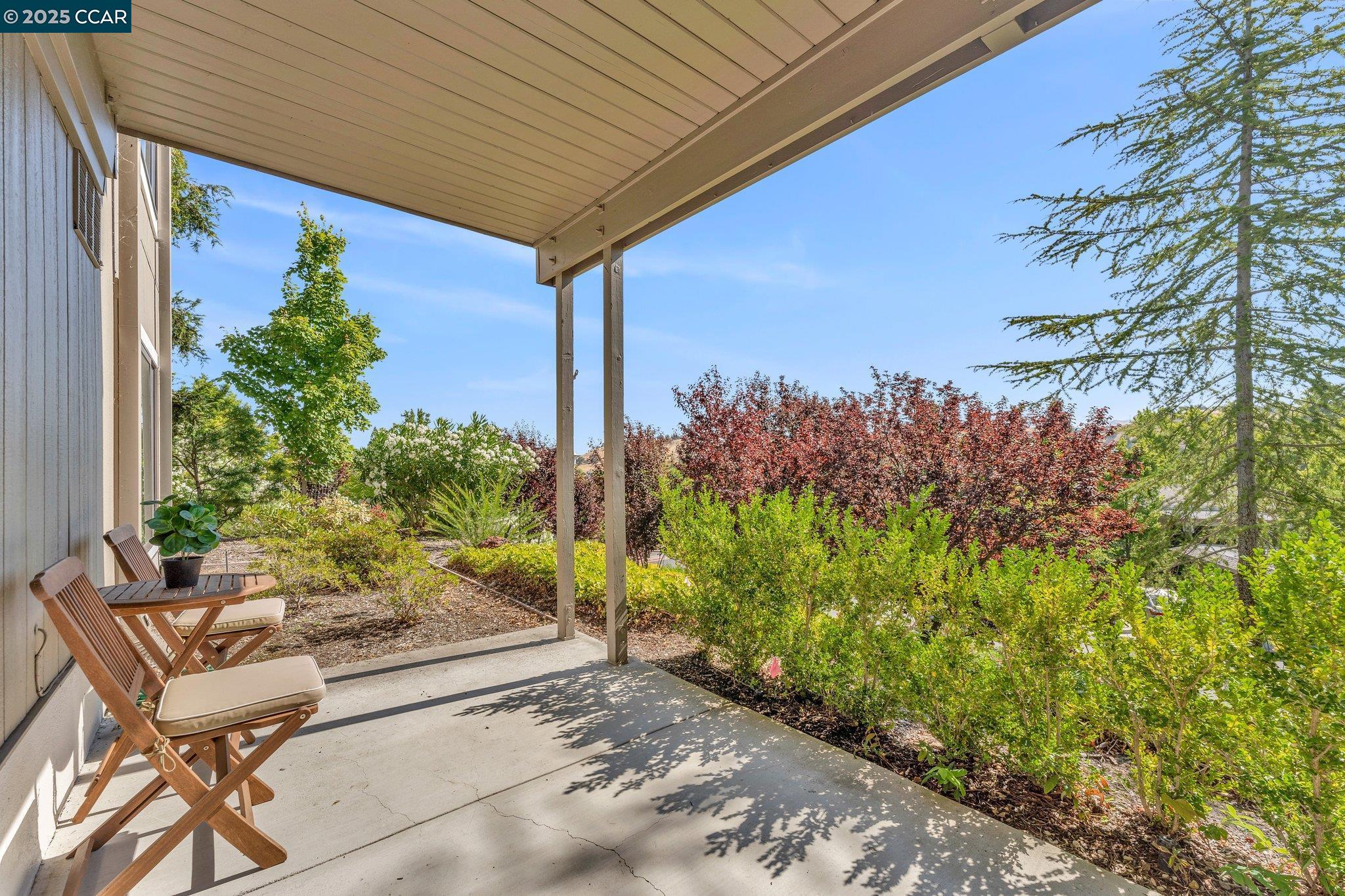 1301 Running Springs Road, Unit 2 Walnut Creek, CA 94595 - Photo 1 of 1 a view of a chairs and table in the patio