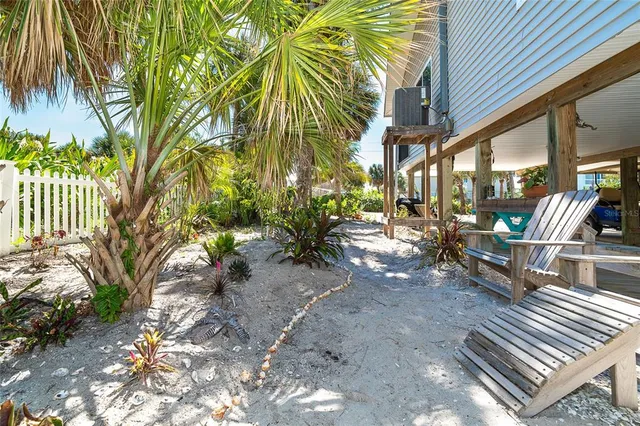 a view of path along with deck and outdoor seating