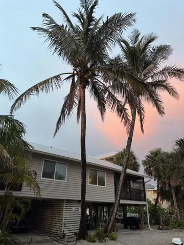 a view of balcony with wooden floor
