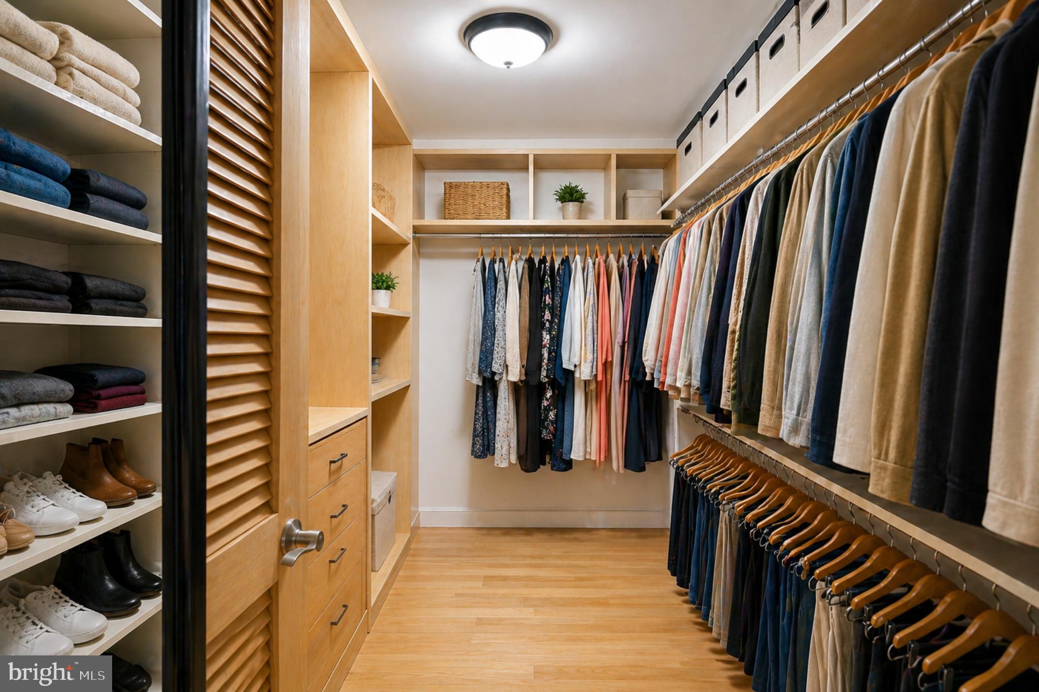 4516 Yates Road Beltsville, MD 20705 - Photo 15 of 31 a view of walk in closet with clothes and shoes