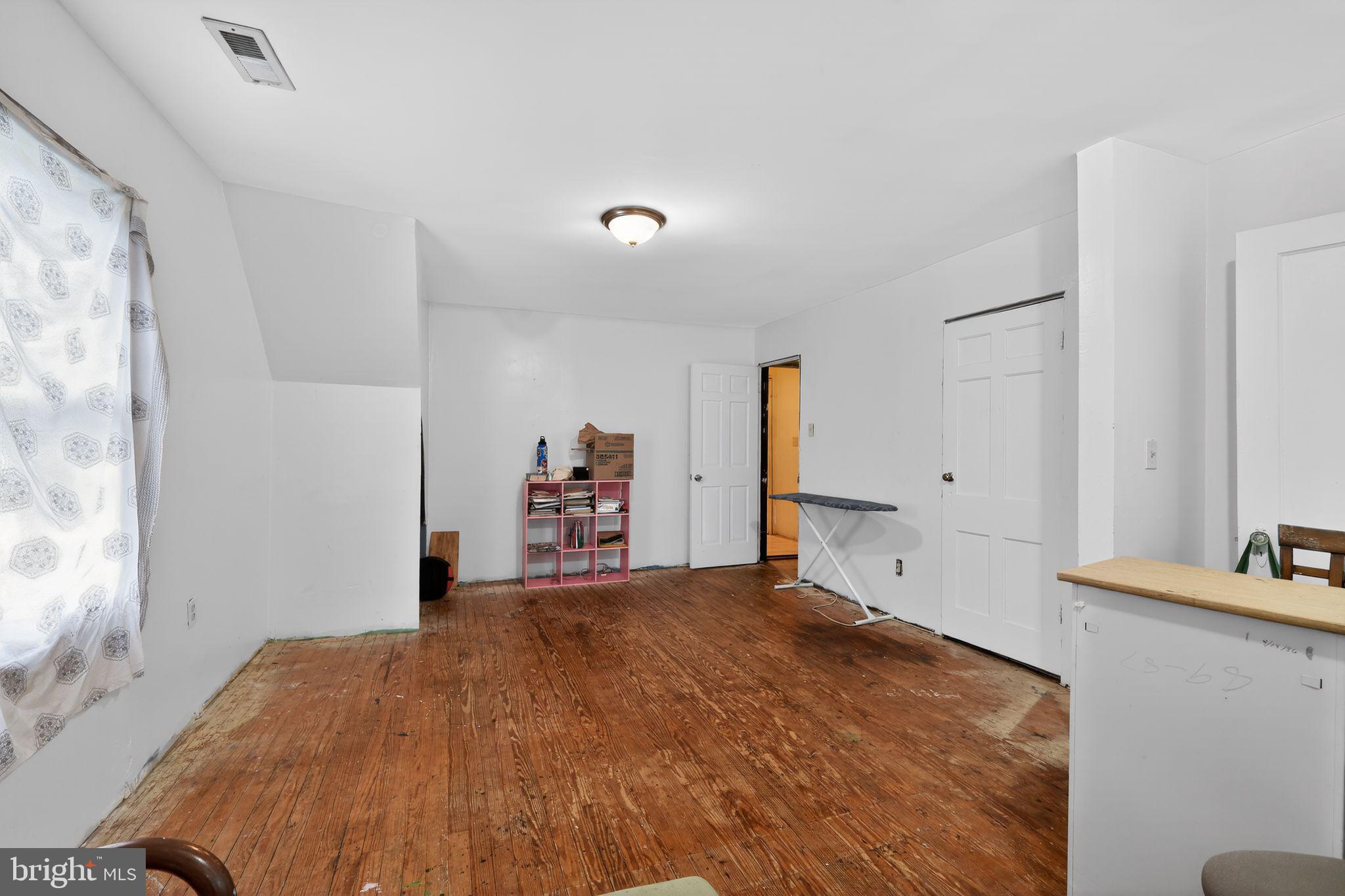 4516 Yates Road Beltsville, MD 20705 - Photo 22 of 31 a bedroom with a bed and a window