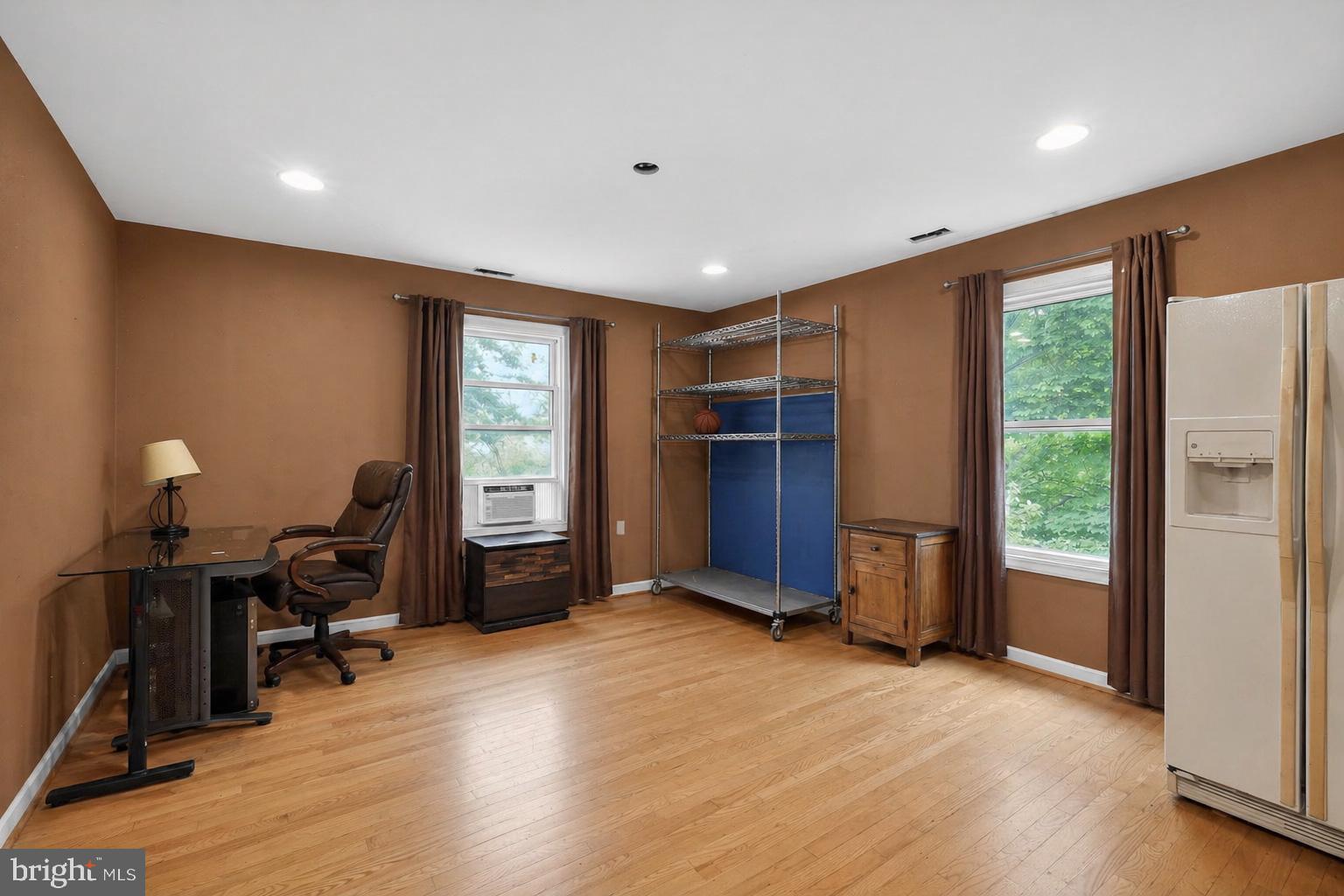 4516 Yates Road Beltsville, MD 20705 - Photo 24 of 31 a view of a livingroom with furniture hardwood floor and a window