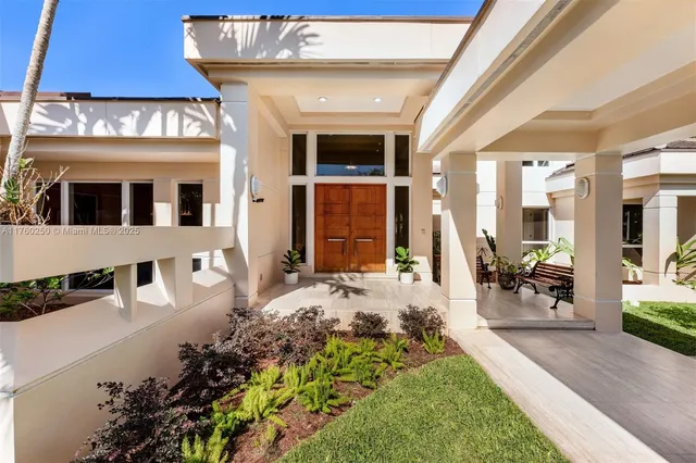 a front view of a house with a porch