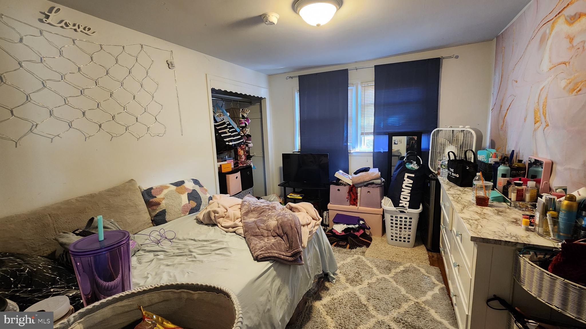 600 Heston Road Glassboro, NJ 08028 - Photo 7 of 9 a bedroom with furniture and a lamp