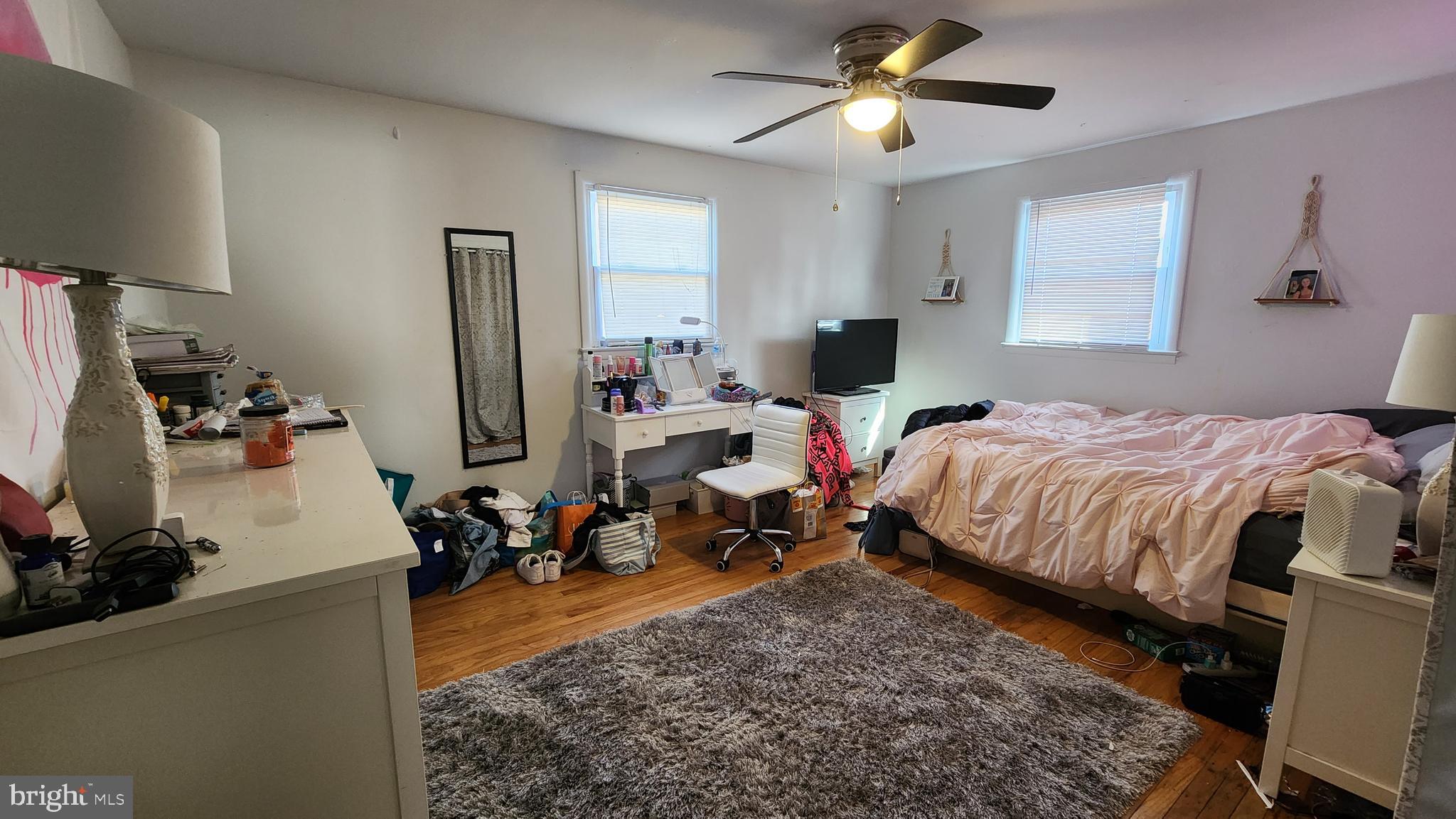 600 Heston Road Glassboro, NJ 08028 - Photo 8 of 9 a bed room with a bed mirror and a window