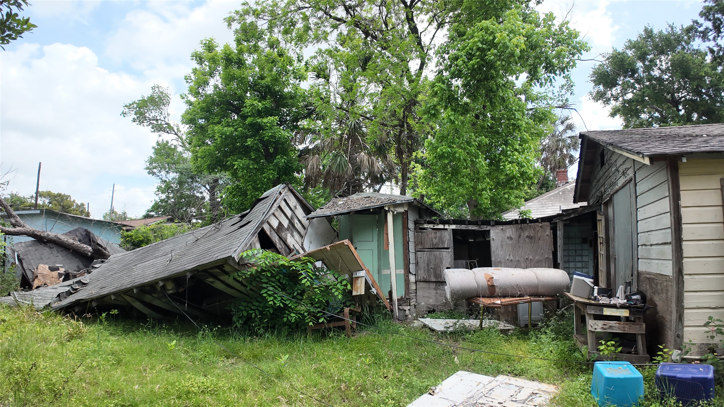 7935 Sherman Street Houston, TX 77012 - Photo 22 of 23 a view of a chair and table in backyard of the house