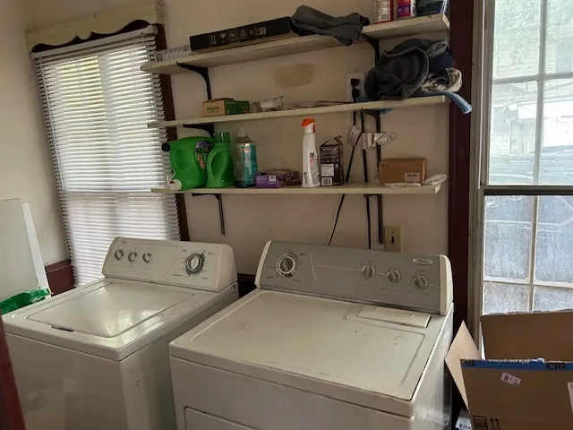 a utility room with dryer and washer