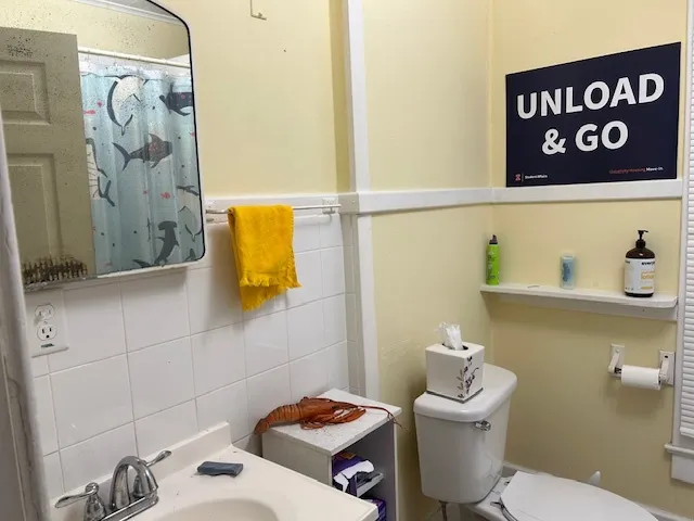 a bathroom with a toilet and sink