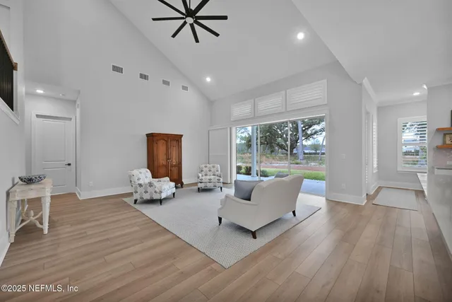 a view of a park with large trees