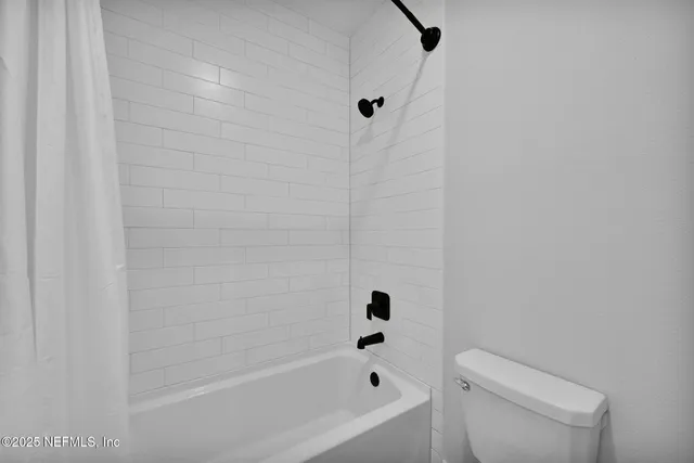 a view of a lake with a city