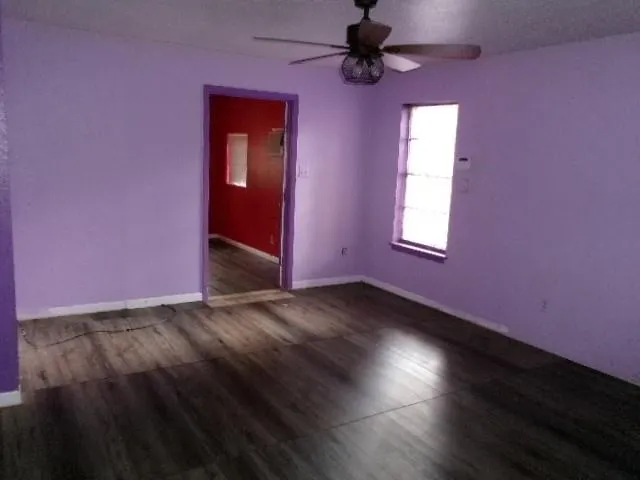 an empty room with windows