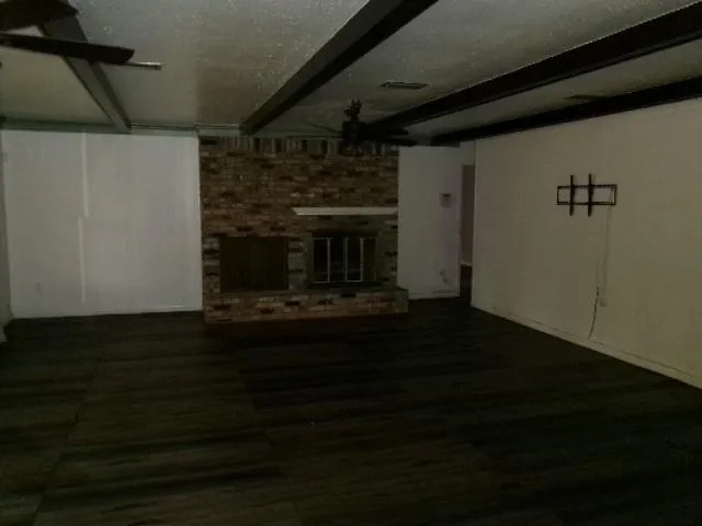 a living room with a fireplace