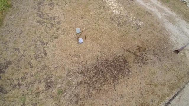 a view of a water pond with green space
