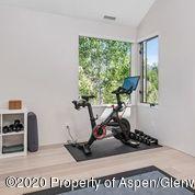 336 Allison Lane, Unit A Basalt, CO 81621 - Photo 16 of 18 a room with furniture and a window