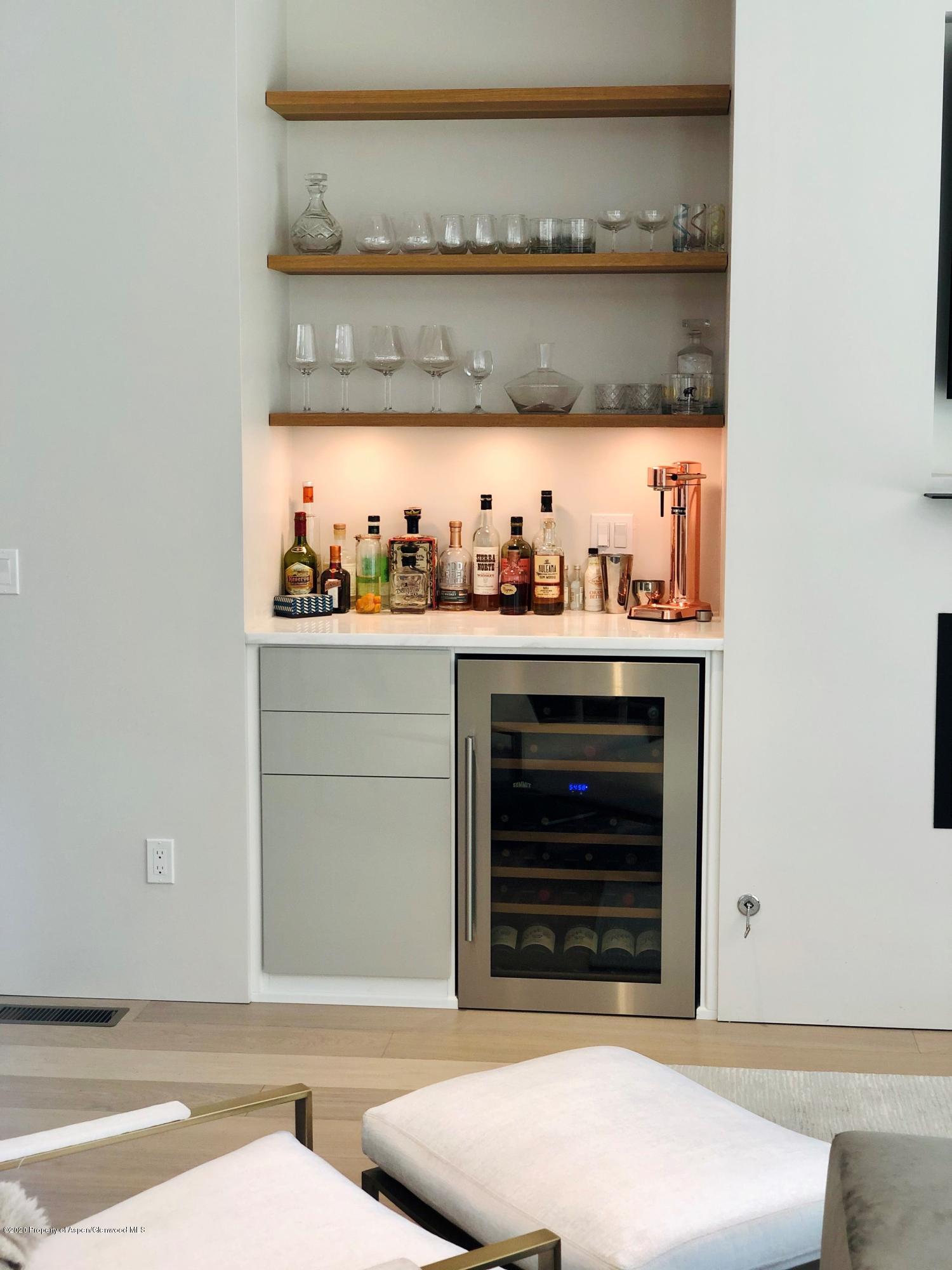 336 Allison Lane, Unit A Basalt, CO 81621 - Photo 5 of 18 a kitchen with a stove and cabinets