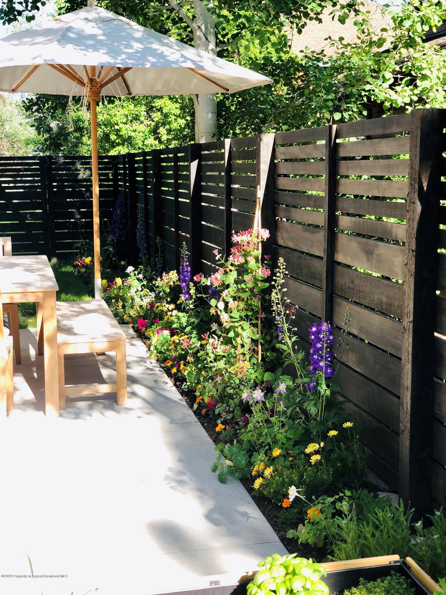 336 Allison Lane, Unit A Basalt, CO 81621 - Photo 8 of 18 a view of a backyard with sitting area