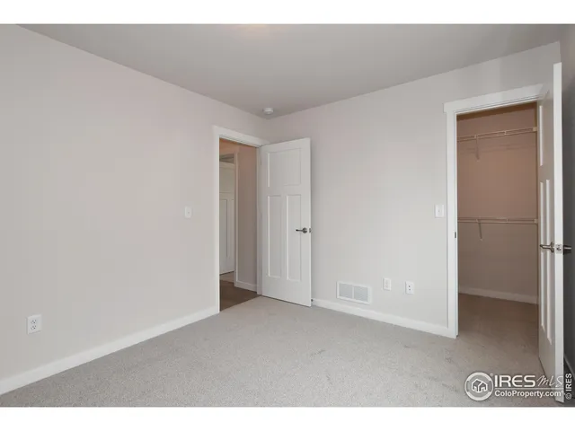 a bathroom with a sink a shower and a mirror