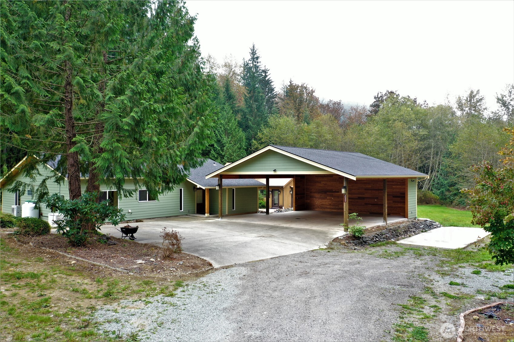 30331 Heimer Road Arlington, WA 98223 - Photo 11 of 37 a view of a house with a yard and large tree