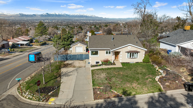 4426 South 3035 East Holladay, UT 84124 - Photo 40 of 49 Aerial view of residential area with mountains