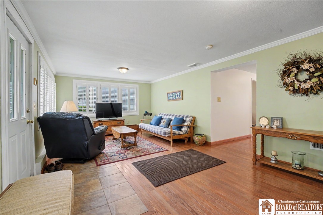 4568 Warners Bay Road Ellery, NY 14712 - Photo 19 of 43 relaxing bonus room with hardwood floors, natural
